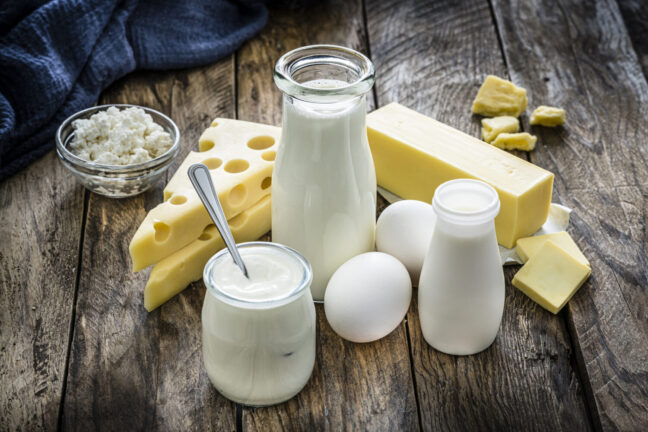 Dairy products on rustic wooden table